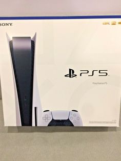 the box for the new sony playstation 5 console is shown in front of it's packaging