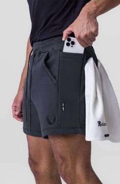 Keep comfortable and move with ease during your cross-training sessions in these cotton-blend terry shorts that have lots of stretch and wick away moisture. 6" inseam; 25" leg opening; 13" front rise; 15 1/2" back rise (size Medium) Elastic/drawstring waist Front slant pockets; side drop-in pockets SilverPlus® technology wicks away sweat using silver ions embedded in the fiber to inhibit the growth of odor-causing bacteria 85% cotton, 13% polyester, 2% spandex. Machine wash, line dry Imported Mens Activewear Fashion, Gym Shorts Men, Fitness Activewear, Men's Sportswear, Mens Swim Shorts, Terry Shorts, Tech Fashion, Shorts For Men, Training Shorts