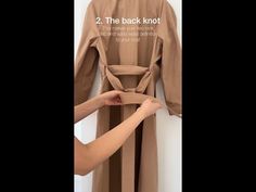 3 Ways to Tie a Trench Coat - YouTube Coat Tied Around Waist, Tie Belt Coat, Tie Coat Belt Back, How To Tie A Trench Coat In The Back, How To Style Trench Coat, How To Tie A Coat Belt, How To Tie Long Coat Belt, How To Tie A Trench Coat Belt, How To Tie A Coat Belt In The Back