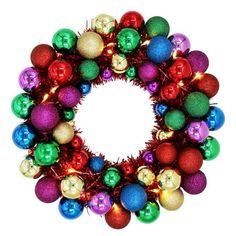 a colorful christmas wreath with ornaments and lights