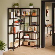 an open bookcase with books and pictures on it in the corner of a room