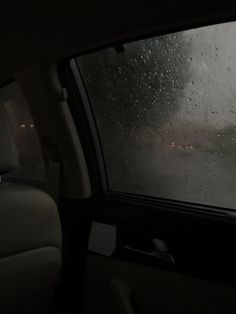 the rain is coming down in the car