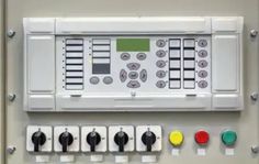 an electrical panel with buttons and switches