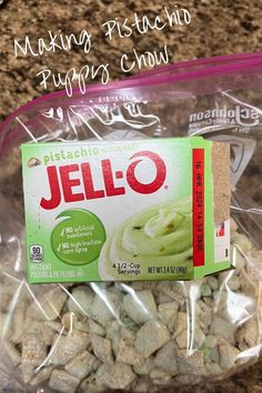 a package of jello sitting on top of a counter next to a pile of rocks