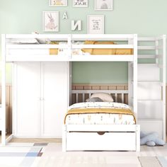 a white bunk bed with drawers underneath it