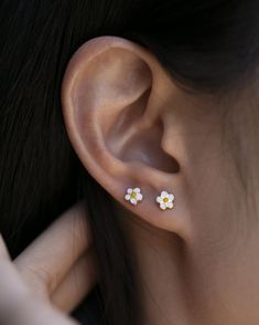 E&E PROJECT 14K SOLID GOLD SERIES------------------------------------------------------Daisy EarringsLightest cute small daisy earrings.Wear it while showering, swimmingall day, everydayAll earrings post and backings are 14K Gold14K Yellow Gold and Enamel Daisy Flower Stud Earring 6mm studs 1 Pair with 14K gold backings Tiny Minimalist Flower Earrings, Dainty White Pierced Flower Earrings, Cute Hypoallergenic Flower Earrings, Dainty Flower Shaped Earrings For Summer, Dainty Flower Earrings For Summer, Everyday Daisy Earrings, Dainty Summer Flower Earrings, Daisy Shaped Earrings For Summer, Tiny White Dainty Flower Earrings