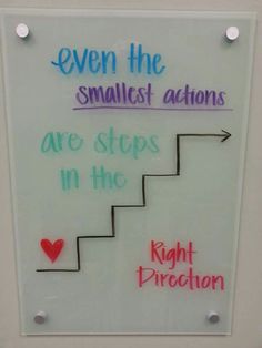 a white sign with writing on it that says, even the smallest actions are steps in the right direction