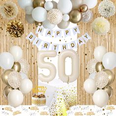 a 50th birthday party with balloons, cake and confetti on the table in front of a bamboo background