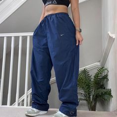 Amazing Rare Nike Oversized fit windbreaker Track Pants Tracksuit Bottom in blue colourway   Tag says XL, can be unisex and could fit most sizes depending on desired fit 34" inner leg Seen on size 10uk, 5'4" for reference Toggled closure, Low to mid rise waist Overall good condition  joggers sportswear trackie track-pant tracksuit bottom sweatpants casual streetwear baggy pants parachute pants y2k 00s gymwear activewear unisex  75 Windbreaker Track Pants, Rare Nikes, Pants Y2k, Nike Vintage, Baggy Pant, Baggy Pants, Mens Long Sleeve Tee, Casual Streetwear, Gym Wear