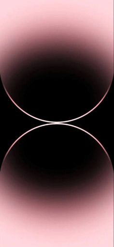 an abstract black and pink background with two circles in the center, on a dark surface