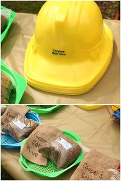 there are two pictures of construction hats on the table