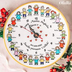 a clock decorated with children's names and numbers