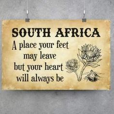 a sign that says south africa on the side of a wall with an image of a flower