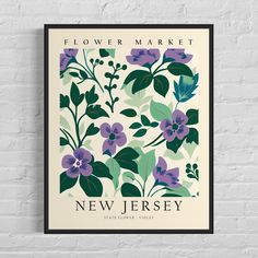 the new jersey flower market poster hangs on a brick wall in front of a white brick wall