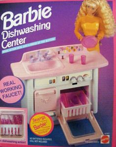 the barbie doll is playing with her toy kitchen and play set in it's box