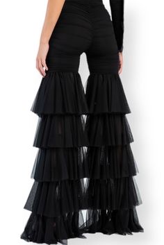 High-waisted tulle pants. Featuring an elasticated waistband, a wide leg, tiered flounce design, and partial knit lining. The model is wearing size S. Model Sizes: Height: 1.76 Bust: 84 Waist: 67 Hips: 101 Fabric Info: %100 Polyester Size Bust Waist Hips S-M 34-35 26-27 35-36 M-L 36-37 28-29 38-40 If the product or your size is unavailable please sign up to notify me when back in stock on the product page. Creative Pants, Tattered Pants, Tulle Pants, Wedding Pants, Lehenga Designs Simple, Queer Fashion, Chic Pants, Black Tulle, Lehenga Designs