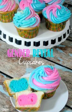 cupcakes with blue and pink frosting are on a plate