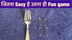 a fork, knife and clips on a blue towel with the words easy easy fun game