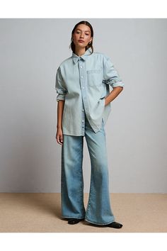 Drapey organic cotton denim/Sustainable, low-impact wash for an authentic vintage look & feel/Mending details/Chest patch pocket/Mother-of-pearl button closure/Sustainable tonal stitching Relaxed Fit Denim Top With Buttoned Pockets, Denim Blue Washed Button-up Jeans, Cotton Button-up Jeans For Everyday, Casual Button-up Relaxed Fit Jeans, Button-up Cotton Jeans For Everyday, Relaxed Fit Washed Blue Button-up Denim Top, Relaxed Fit Washed Blue Denim Button-up Top, Washed Blue Relaxed Fit Button-up Denim Top, Medium Wash Cotton Denim Top With Buttoned Pockets