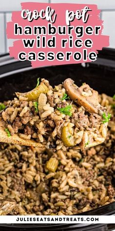 a skillet filled with hamburger and rice casserole on top of a table