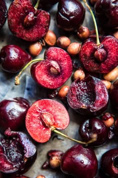 some cherries are sitting on top of each other