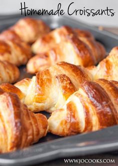 homemade croissants in a baking pan with text overlay that reads homemade croissants