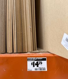 a pile of wood sitting on top of a shelf