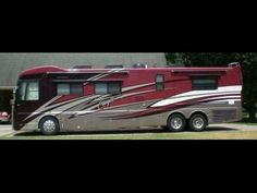 an rv parked in front of a house