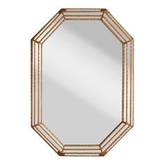 an octagonal mirror with gold trimmings on the sides and a white back ground