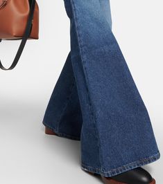 High-rise flared jeans in blue - Chloe | Mytheresa Free Spirit Aesthetic, Faded Denim, Flared Jeans, Color Names, Flare Jeans, Chloe, Color Design, Top Brands, High Rise