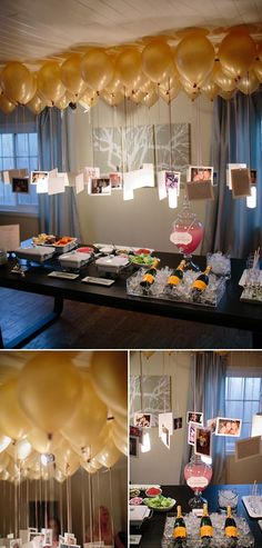 balloons are hanging from the ceiling above a table with food and drinks on it, along with pictures