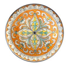 an orange and white plate with designs on it