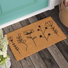 a door mat with flowers drawn on it