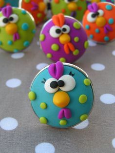 there are many cupcakes decorated like angry birds on top of polka dot tablecloth