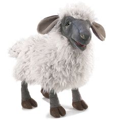 a stuffed sheep is shown in front of a white background with the caption's name on it