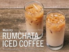 two iced drinks sitting next to each other on top of a wooden table with the caption must try rumchata iced coffee