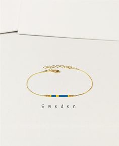 "National Flag of Sweden bracelet. Swedish colors jewelry. Gift for the girlfriend or the best friend from Sweden. Motherland gift. Country of origins bracelet.   This listing for one bracelet.  On the 1st image is shown SWEDEN Flag Bracelet. A bracelet with the colors of many other countries' flags is also available. Please ask us if this is possible before ordering. The chain, space beads and closure are available in gold tone (default) or silver tone (by request). DETAILS - Japanese color gla