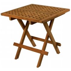 a small wooden table with holes on it