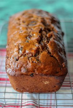 a loaf of bread sitting on top of a cooling rack