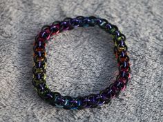 Listing is for the pictured item. This handmade bracelet is made with anodized aluminum rings and black rubber rings. This bracelet is PRIDE LGBTQ+ themed. Chainmail Bracelet, Rubber Rings, Anodized Aluminum, Handmade Bracelet, Black Rubber, Handmade Bracelets, Rainbow, Bracelet, Black