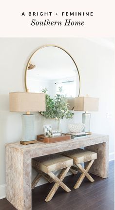 a console table with two stools and a mirror on the wall above it that says, a bright + feminine southern home