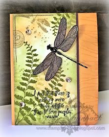 a card with a dragonfly on it