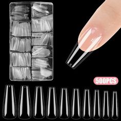 Introducing the TSV 500pcs Long Coffin Nail Tips, which crafted with precision, they offer a sleek, elegant finish, adding a touch of sophistication to your manicure. Whether you're a nail enthusiast or a professional nail technician, these full cover ballerina fake nails are perfect for creating stunning, long-lasting manicures. Say goodbye to the hassle of frequent salon visits and hello to beautiful, salon-quality nails from the comfort of your own home. Size: 7" x 3.8" x 1.2".  Color: Clear. Clear Press On Nails, Nails Clear, Beautiful Salon, Coffin Nails Long, Nail Technician, Professional Nails, Coffin Nails, Fake Nails, Nail Tips