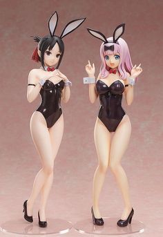 two figurines that are wearing bunny ears