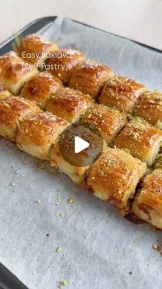 Dee | Food for everyone on Instagram: "6 Days of Christmas Sweet Treats Pt 1 🎅

Easy Baklava with Puff Pastry 

1 x sheet puff pastry 

Filling:
100g pistachios blended fine 
50g walnuts blended chunky 
1/4 x cup honey 
30g melted butter 
1/4 tsp orange blossom or rose water 

Topping:
1 x egg yolk 
Drizzles of honey 
Some of the pistachios 

Preheat oven to 180C

Mix all the filling ingredients together except for the walnuts and  a bit of the pistachios to sprinkle at the end.

Cut your puff pastry into 3 lengthways, take one strip and add 1/3 of the pistachio mix to the right side as shown in the reel and then top with some walnuts, roll the pastry over, tuck it in and roll over again, repeat this process with the other 2 strips of pastry. Put them on a baking sheet with greaseproof pa Easy Baklava, Pastry Filling, Puff Pastry Filling, Christmas Sweet Treats, Egg Yolk, Baklava, Puff Pastry, Baking Sheet, Rose Water