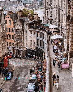 an aerial view of edinburgh, united kingdom with lots of people walking on the street