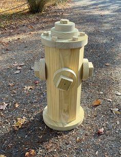 How to build a wooden fire hydrant Diy Fire Hydrant, Fire Hydrant Craft, Downloadable Woodworking Plans, Rustic Outdoor Furniture, Wooden Toys Plans, Woodworking Shop Projects, Rustic Wood Furniture, Wood Art Projects, Diy Wooden Projects