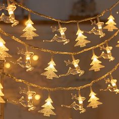 a string of christmas lights hanging from the ceiling