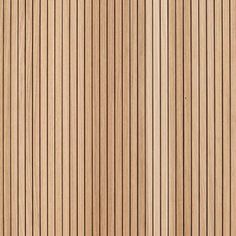 a close up view of the wood grains on a door paneled with vertical stripes