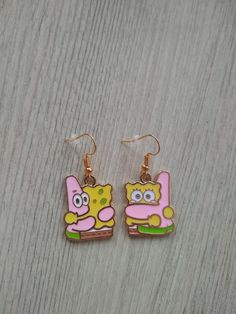 ❤ INFORMATION ❤  These cute cartoon hug earrings have gold plated hooks. The size of the charm is 25x20 mm. The earrings are a nice colorful addition to any outfit, for a cheerful look for yourself or as an original gift for someone else! Sold per pair and you will receive the earring stoppers.  ❤ CARE ❤  I do not recommend swimming or showering with your jewelry on. When cleaning sterling silver jewelry, I recommend using a natural product.  ❤ PROCESSING TIME ❤  This is a finished product, plea Hug Earrings, Fairycore Earrings, Earrings Fairycore, Clean Sterling Silver, Dangle Earrings Gold, Love Earrings, Hippy Gifts